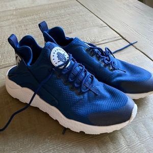 Blue Nike running shoes